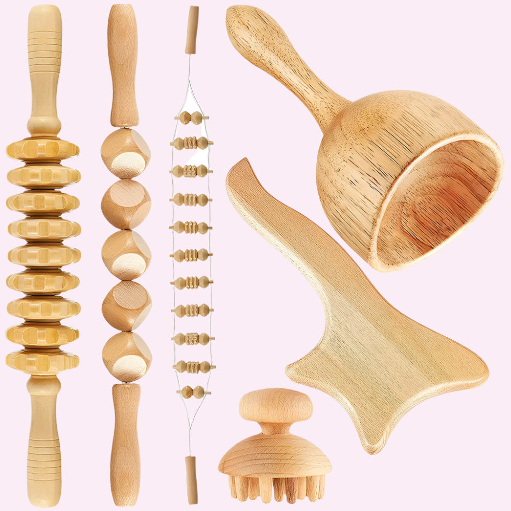 Set of wooden massage tools on a white background