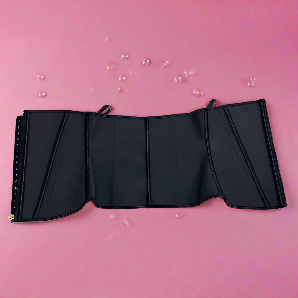 Black waist trainer on a pink background